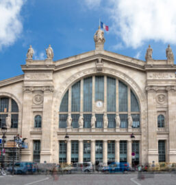 "The facade of the railway station Gard du Nord in Paris, France. Multiple exposure."